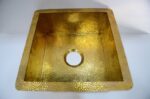 unlacquered brass sink